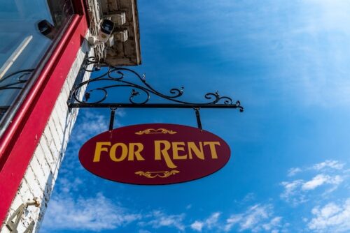 "for rent" sign on building