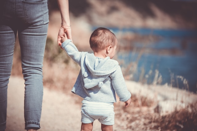 parent walking with child
