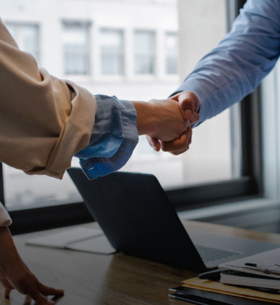 two businesspeople shaking hands